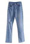 Jeans cintura alta com detalhe rasgado