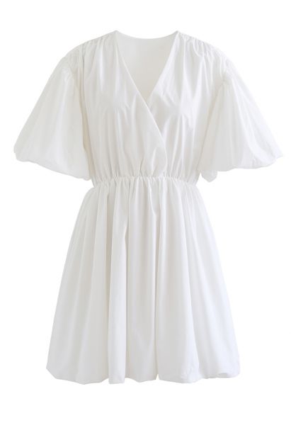 Vestido de algodão com decote em V e mangas bufantes em branco