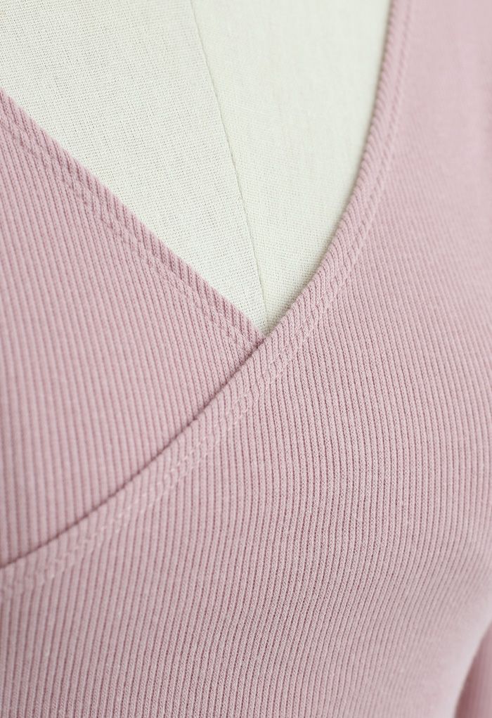 Blusa canelada de mangas compridas cruzadas na frente em rosa