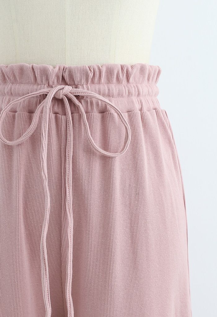 Calças de ioga com nervuras de cintura com cordão e saco de papel em rosa