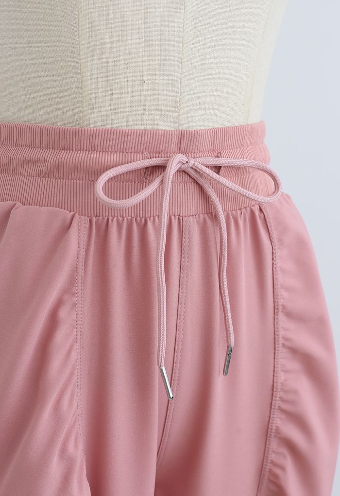 Joggers com cordão na cintura e detalhe franzido em rosa empoeirado