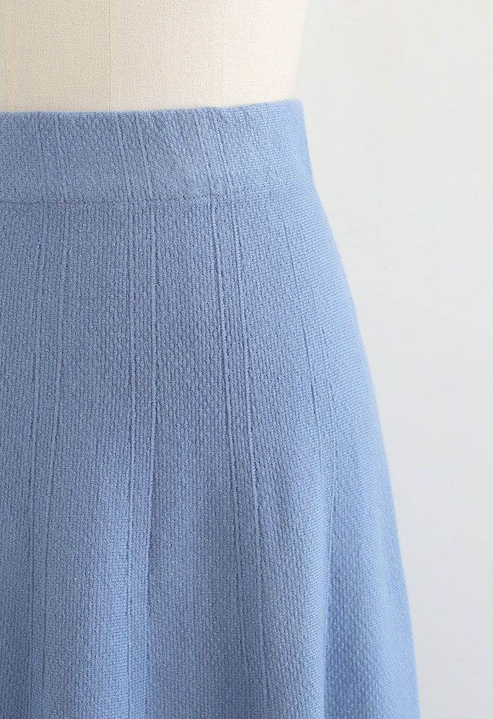 Saia midi de tricô texturizada com bainha flare em azul