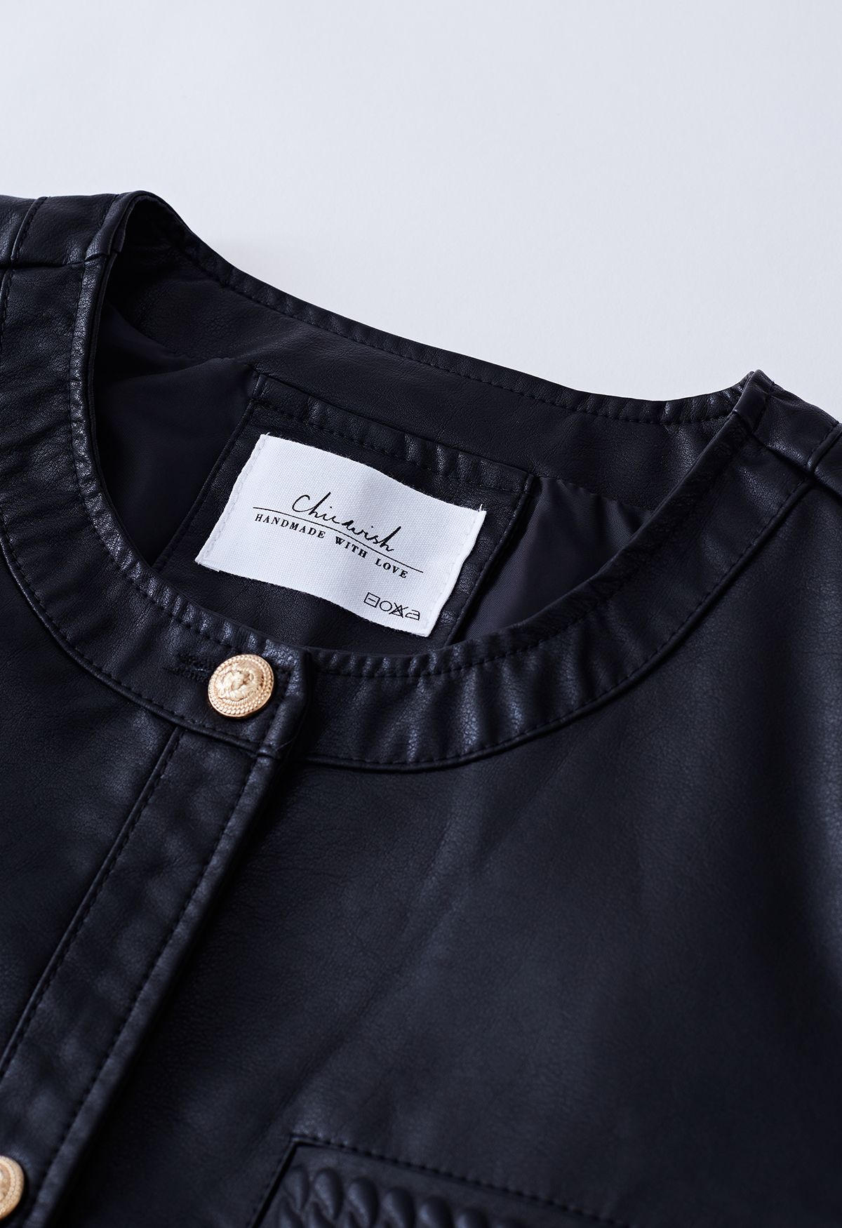 Jaqueta de couro falso com acabamento de bolso Welt em preto