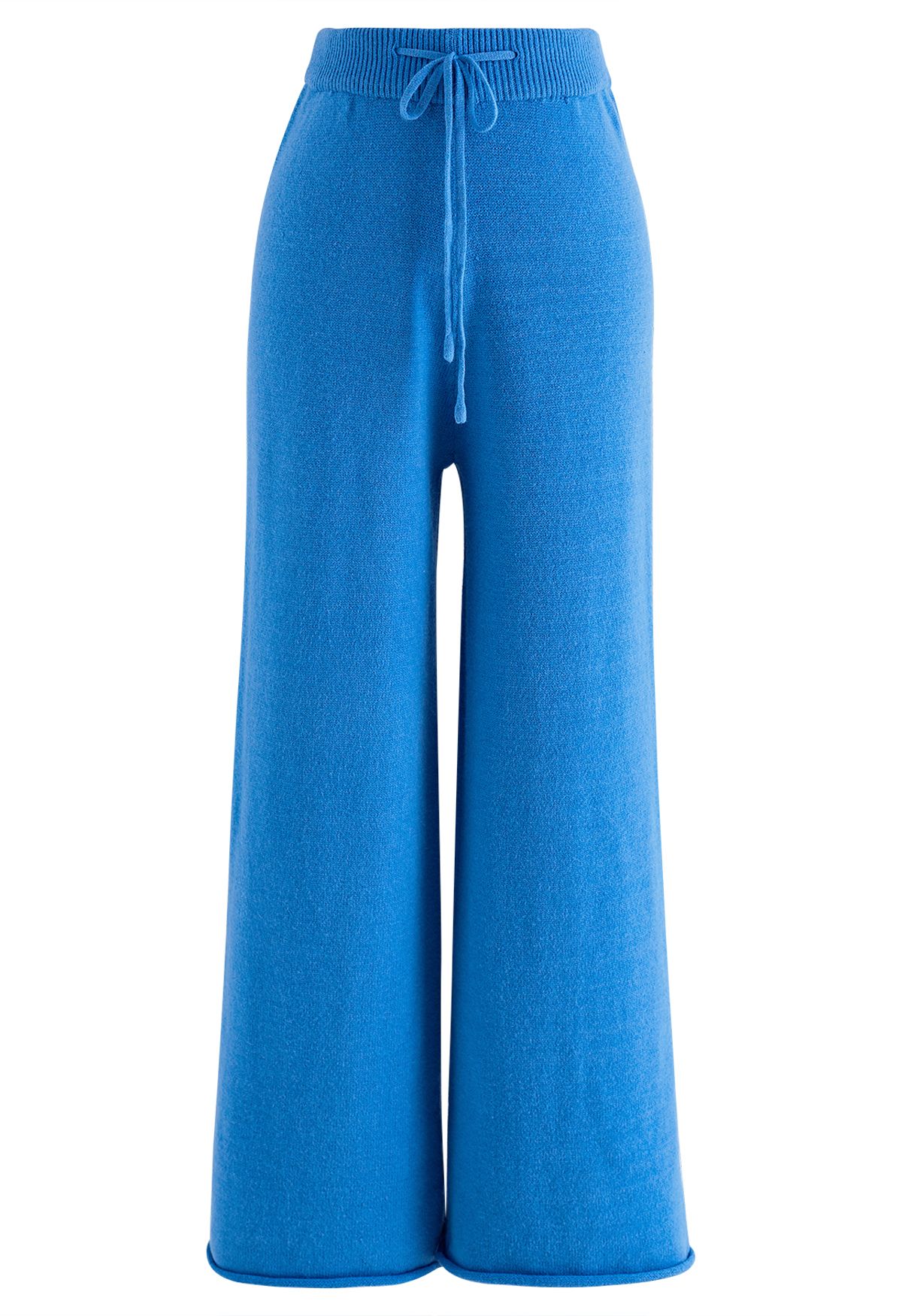 Conjunto de blusa de gola alta abotoada e calça de malha azul