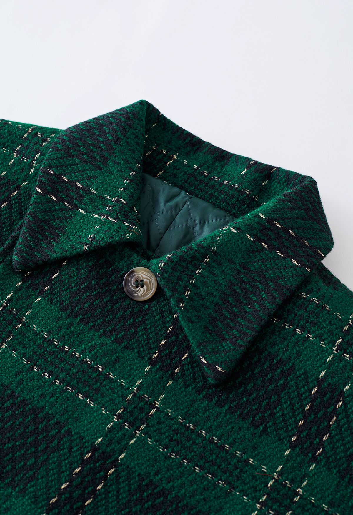 Jaqueta xadrez de tweed metalizada e conjunto de saia plissada em verde
