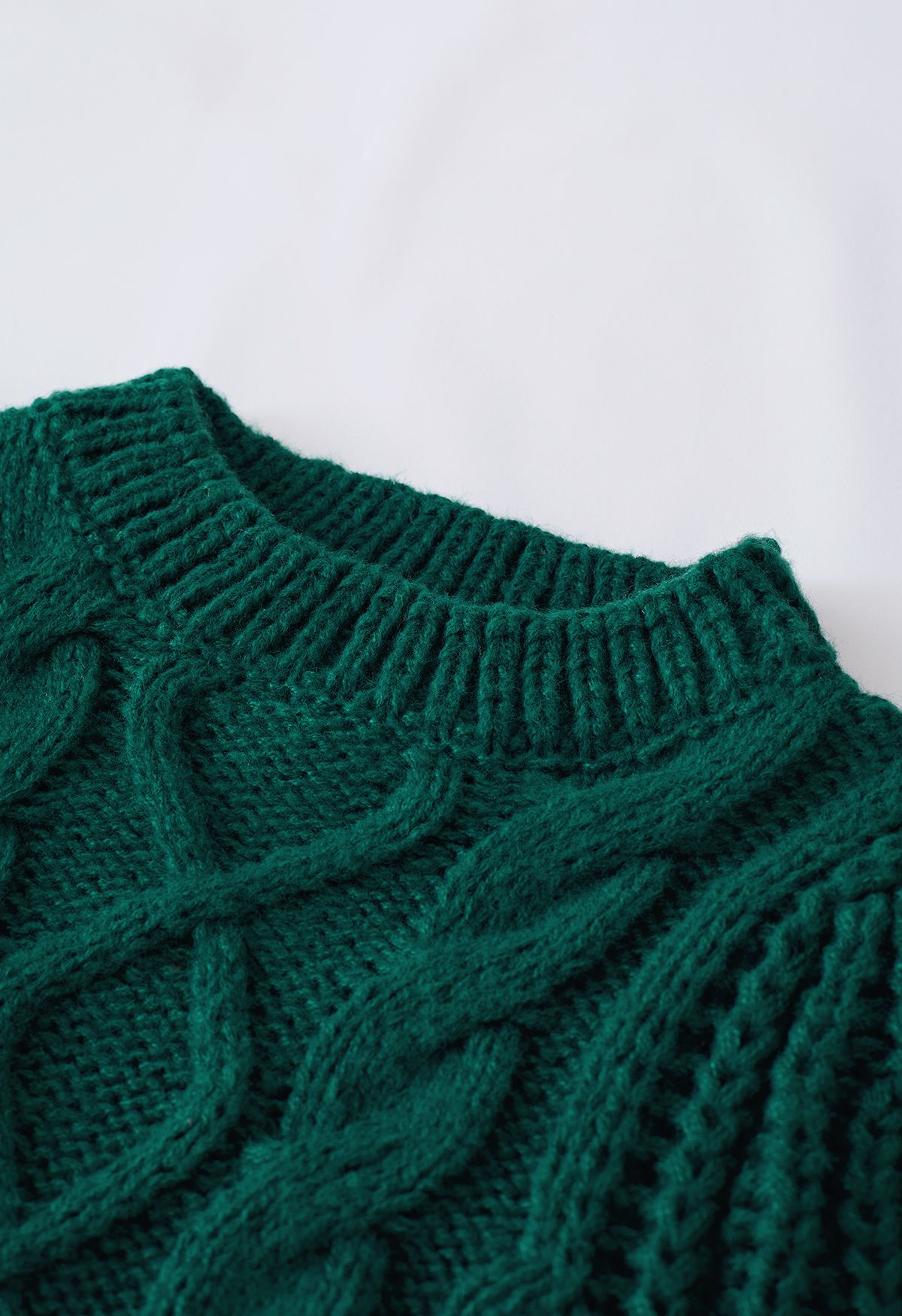 Suéter com nervuras trançado manga bolha em verde escuro