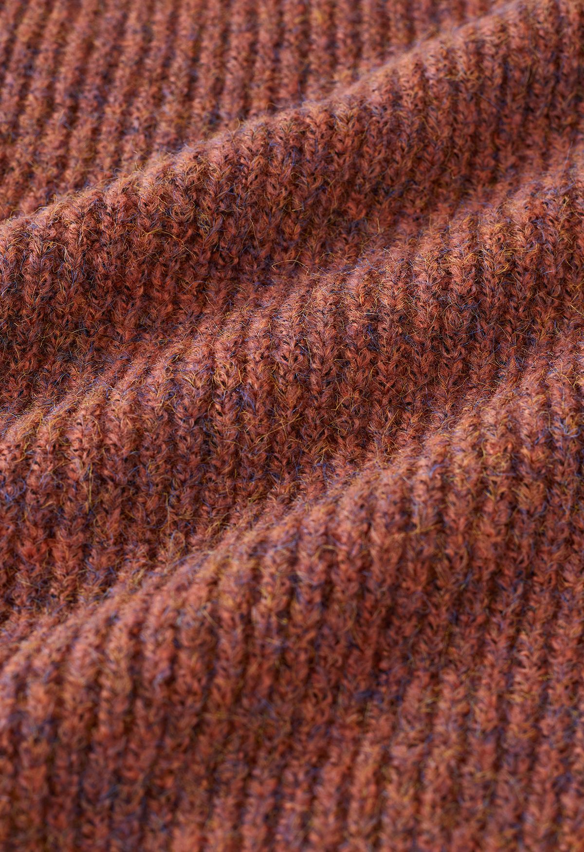 Suéter malha canelada com manga bufante em vermelho ferrugem