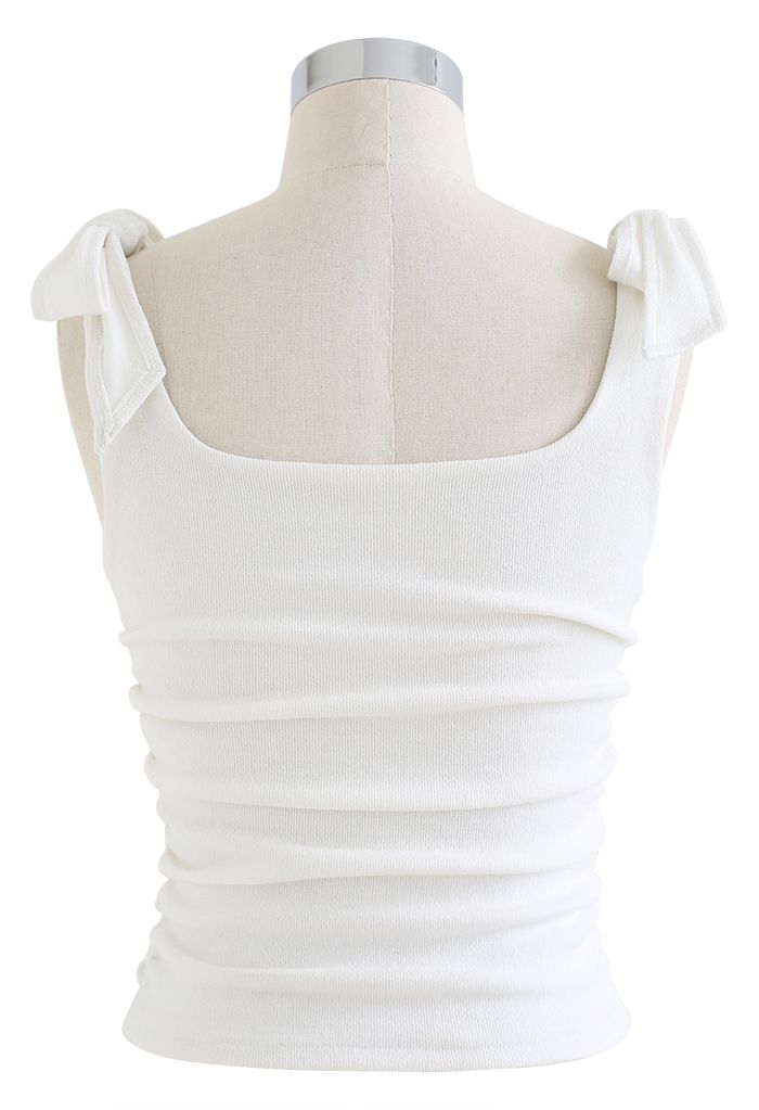 Blusa camuflada com laço lateral franzido em branco