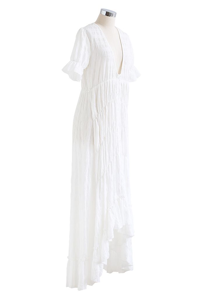 Vestido maxi de bainha assimétrica com decote em V profundo em relevo em branco