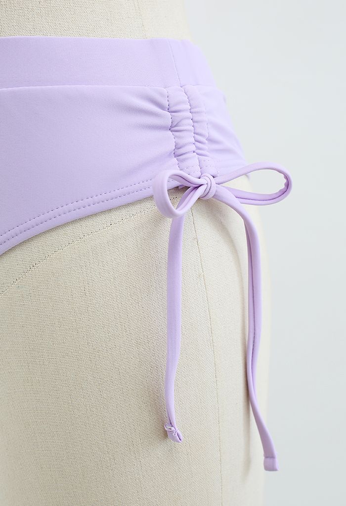 Conjunto de biquíni com cordão em forma de concha lilás