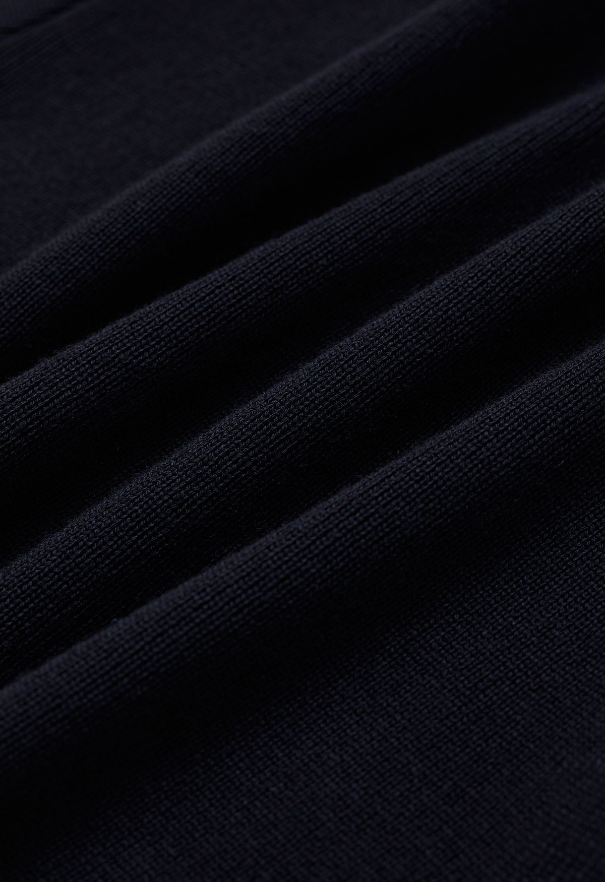 Top cropped de tricô com laço auto-atado em preto
