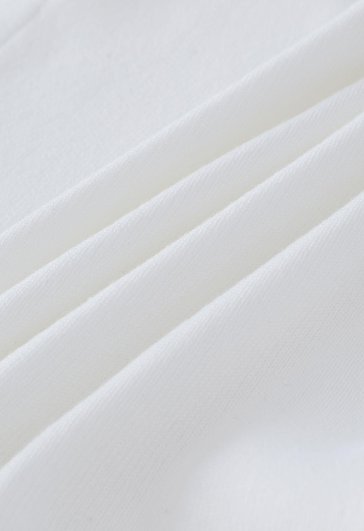 Top cropped de tricô com laço self-tie em branco