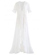 Vestido maxi de bainha assimétrica com decote em V profundo em relevo em branco